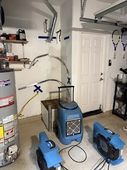 Drying equipment set around a garage water heater