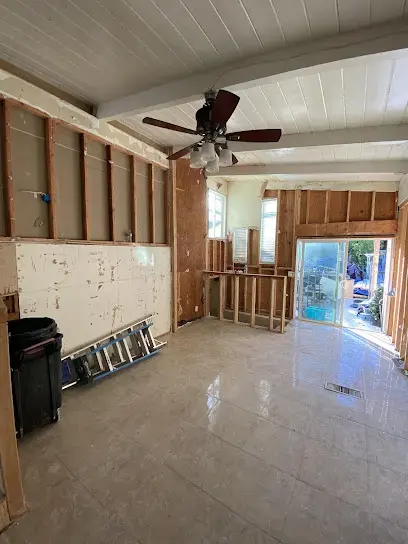 Room opened to the studs for drying after water damage