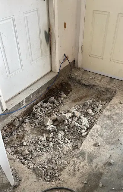 Slab opened to reach a leaking line in La Mesa